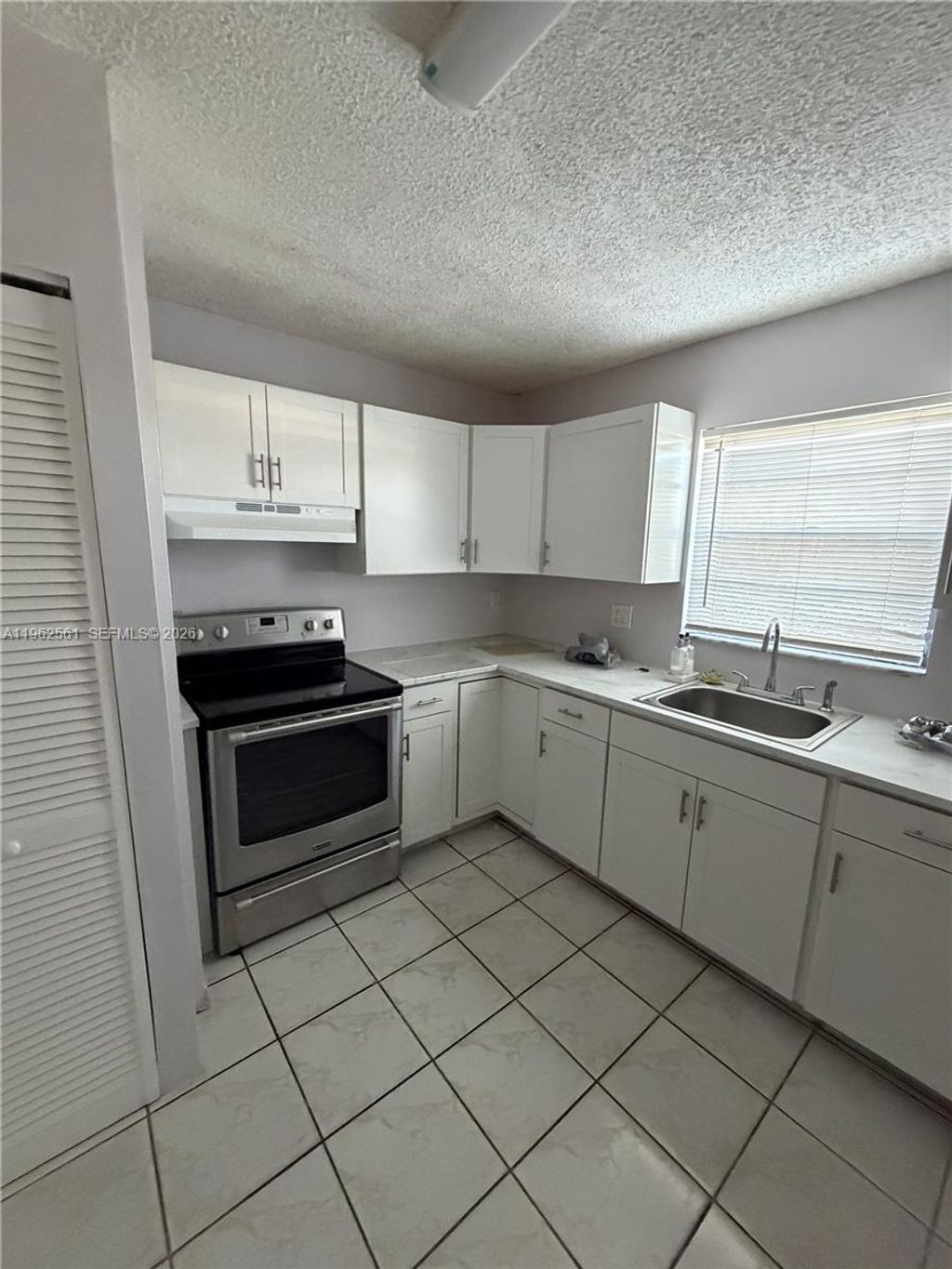 Photo of 8936 NW 21st St #7, Pembroke Pines, FL 33024 (MLS # A11962561)