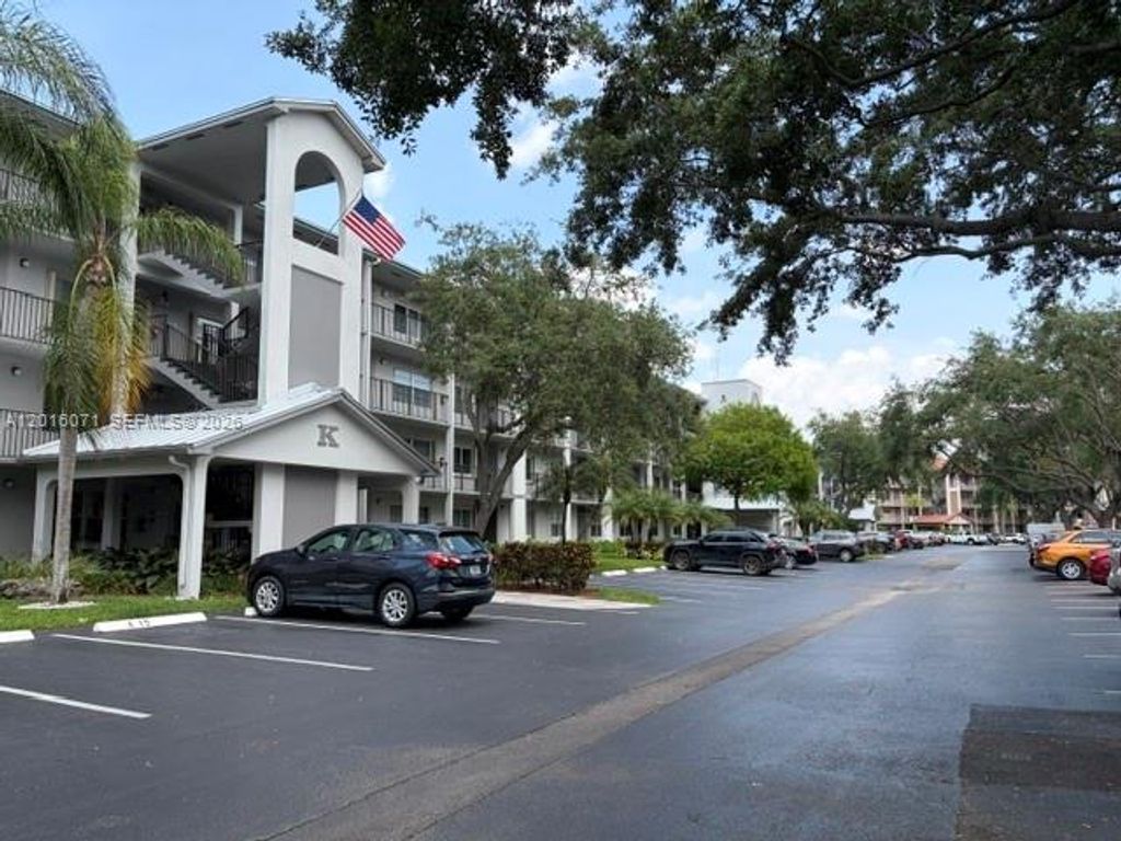 Photo of 1300 SW 125th Ave #308K, Pembroke Pines, FL 33027 (MLS # A12016071)