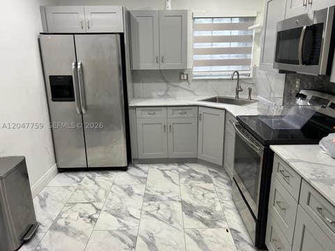 Photo of 18130 NW 25th Ave, Miami Gardens, FL 33056 (MLS # A12047759)