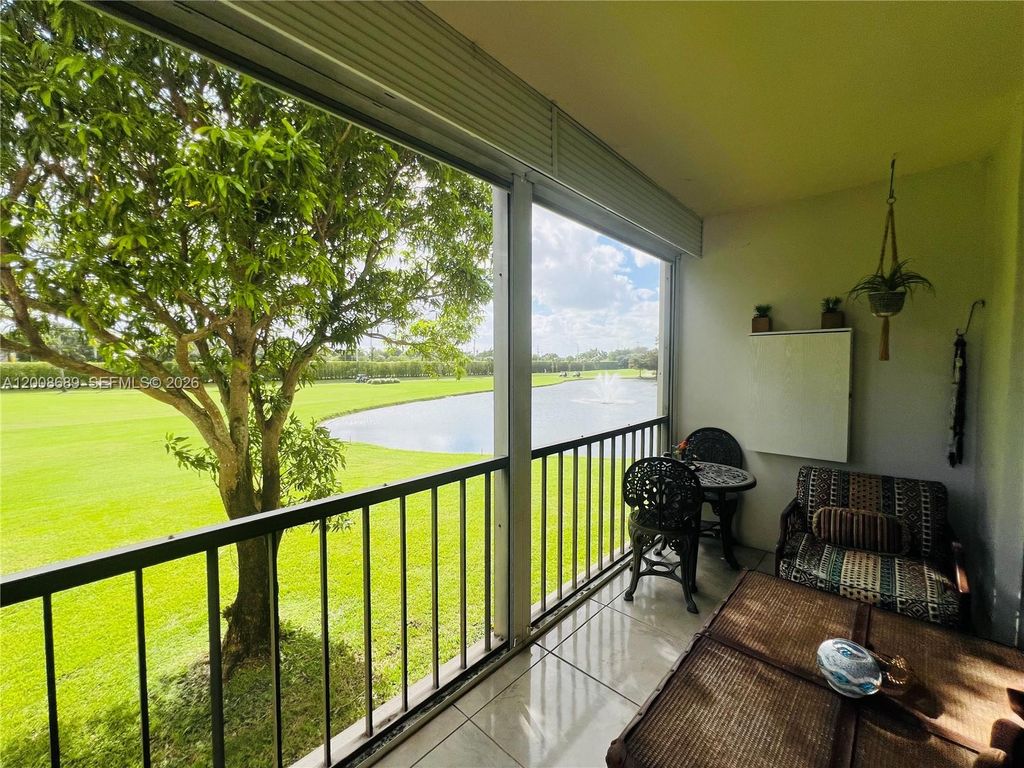 Photo of 9820 S Hollybrook Lake Dr #202, Pembroke Pines, FL 33025 (MLS # A12008689)