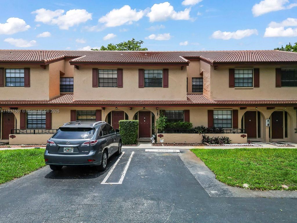 Photo of 10942 W Sample Rd #E1, Coral Springs, FL 33065 (MLS # A11837501)