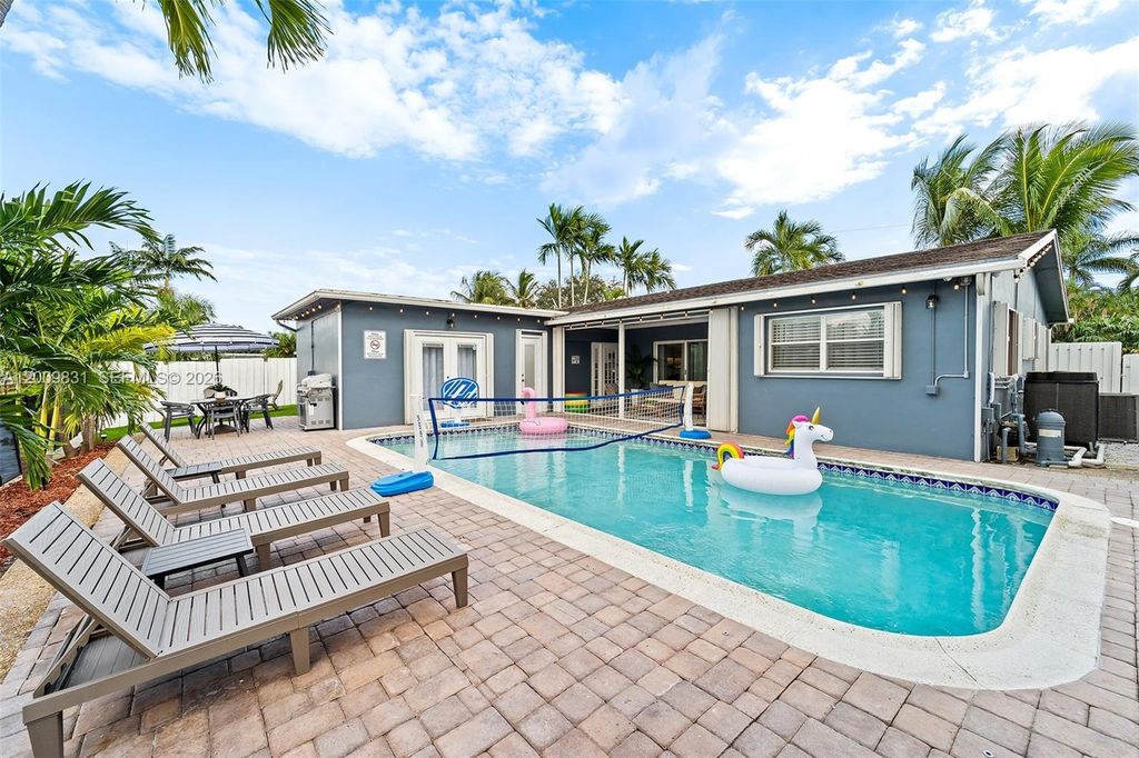 Photo of 2005 NW 37th St, Oakland Park, FL 33309 (MLS # A12009831)