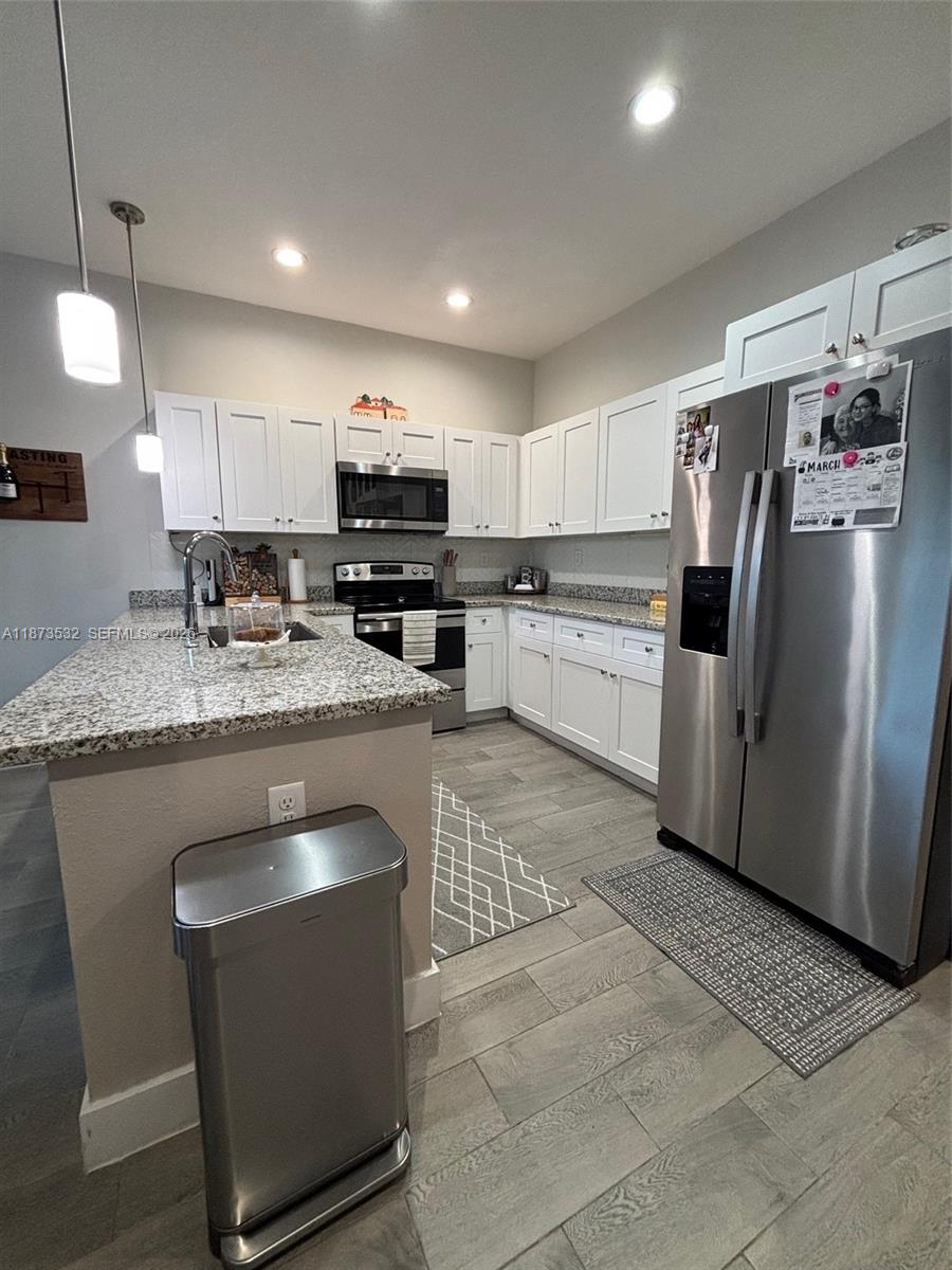 TOWNHOMES ON COCONUT PALM - Residential