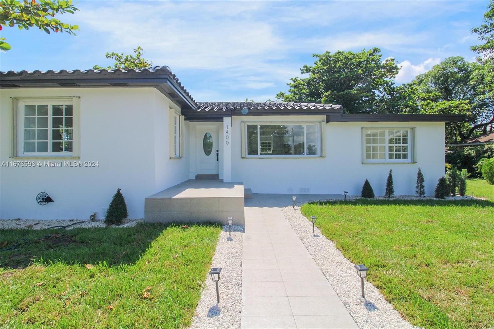Discover this bright and airy corner home with lots of windows and natural light. The property boasts a big kitchen with modern appliances and ample storage. Enjoy the custom-made master bedroom closet, gorgeous vanities, and elegant Spanish ceramic tile throughout.
The huge lot is for outdoor living, featuring fruit trees and a backyard designed to accommodate an RV or boat. Located close to Downtown, Wynwood, parks, and top-rated schools, this home has blend of comfort and convenience.