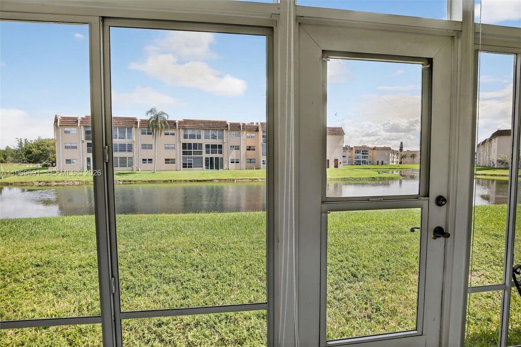 Photo of 8951 Sunrise Lakes Blvd #105, Sunrise, FL 33322 (MLS # A11969691)