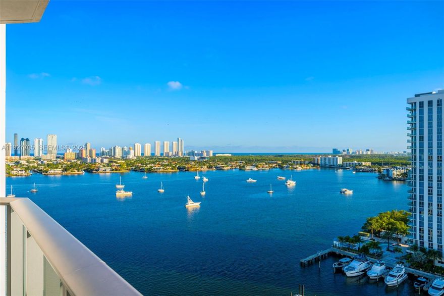 Set above the marina with wide, unobstructed Intracoastal and ocean views, this 1,670 SF residence offers a calm, refined take on waterfront living in Aventura. Originally delivered as a developer model unit, Residence 1803 features upgraded finishes and a thoughtful coastal design framed by floor-to-ceiling windows and a private terrace overlooking the water.

The split-bedroom layout enhances privacy while inviting natural light throughout the home. Interior details include drop-down ceilings with recessed lighting, custom millwork, and a contemporary open kitchen appointed with integrated appliances and stone countertops. The primary suite serves as a peaceful retreat with a generous walk-in closet and a spa-inspired bath finished in glass and stone—all oriented toward wide water views.

Practical benefits add meaningful value: two deeded parking spaces, with the option to sell one separately (valued around $60,000), and no current assessments.

Residents enjoy access to a full-service marina and yacht club, resort-style amenities including a waterfront pool deck, fitness center, spa, children’s playroom, concierge, valet, and 24-hour security. Ideally located within the Aventura marina district, close to beaches, dining, SoLé Mia Hospital, and shopping—with Houston’s next door—Residence 1803 blends modern coastal design with the comfort and convenience of luxury waterfront living.