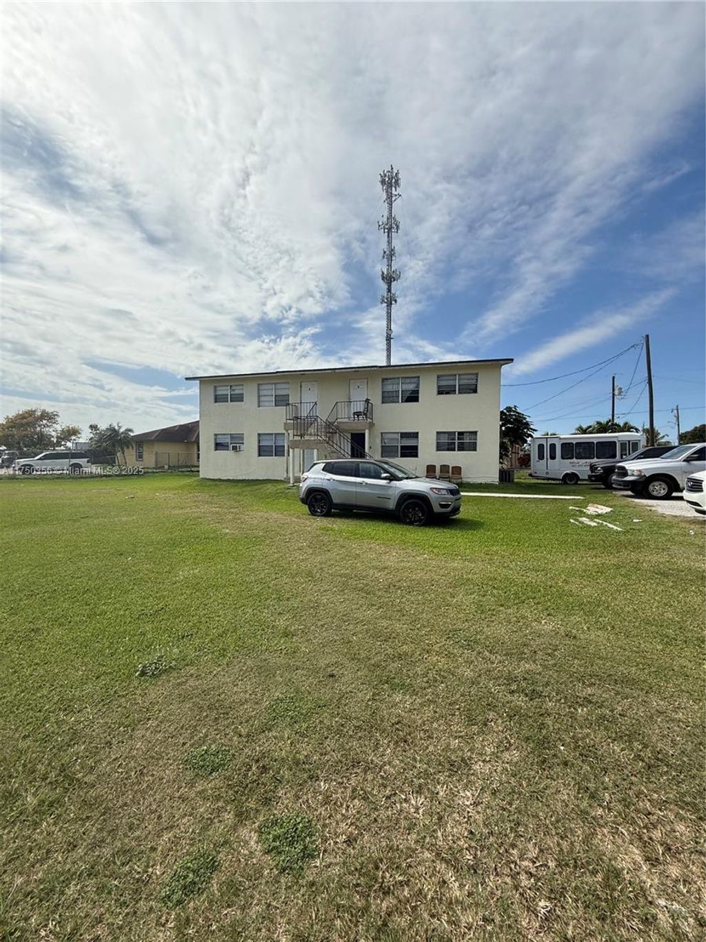 Photo of 124 NW 12th Dr, Belle Glade, FL 33430 (MLS # A11750356)
