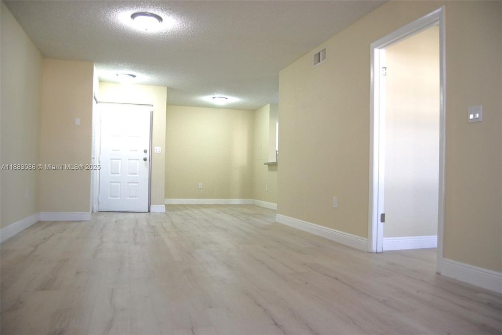 Photo of 2820 N Oakland Forest Dr #109, Oakland Park, FL 33309 (MLS # A11883086)