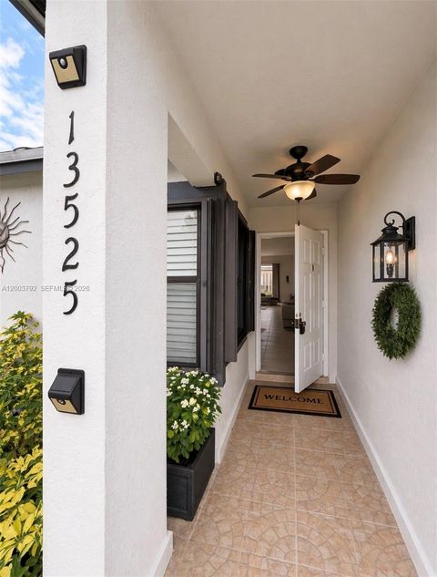 Photo of 13525 SW 115th Pl, Miami, FL 33176 (MLS # A12003792)