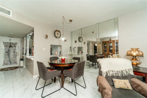 Photo of 2811 N Pine Island Rd #102, Sunrise, FL 33322 (MLS # A12029263)
