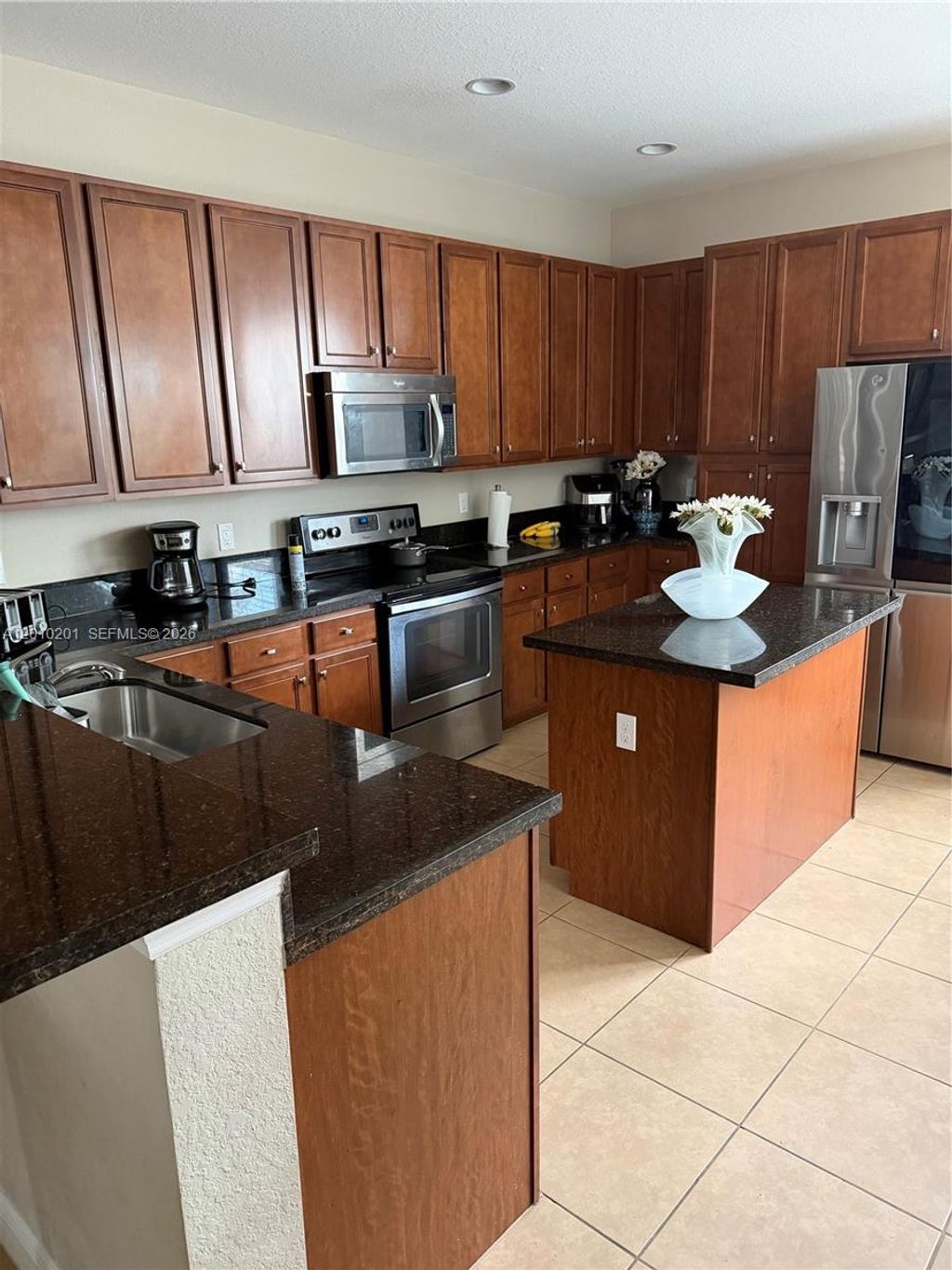Photo of 11942 SW 26th Ct, Miramar, FL 33025 (MLS # A12010201)