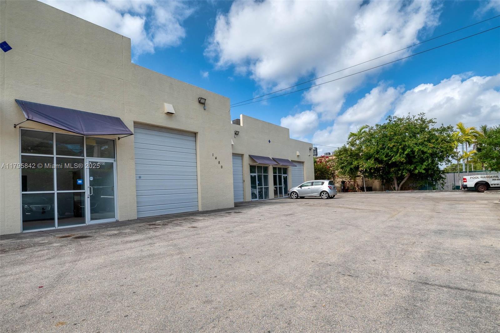 We are proud to present this is a rare opportunity to own a warehouse in top Miami Neighborhood. With 2,005 sq. ft. of versatile space, this property is perfect for distribution, storage, & a variety of uses. It features a ground-level loading door and 20-foot ceiling height, located adjacent to the office entrance. Two interior car lifts belonging to the seller will remain with the property. The property is also conveniently close to neighboring communities such as Aventura, Bal Harbor, Biscayne Park, & Miami Shores, with easy access to I-95 and Biscayne Blvd. This space is ideal for an end-user looking to establish a new business or expand an existing one. Great investment opportunity, as such properties rarely come up for sale in the area.