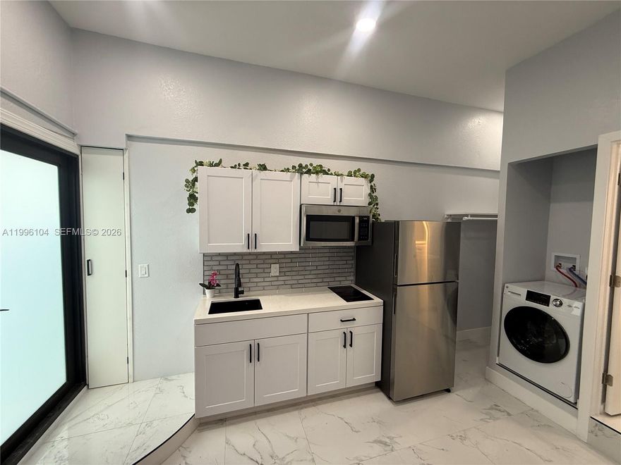 Newly remodeled, Furnished studio unit for one person featuring an in-unit washer and dryer.