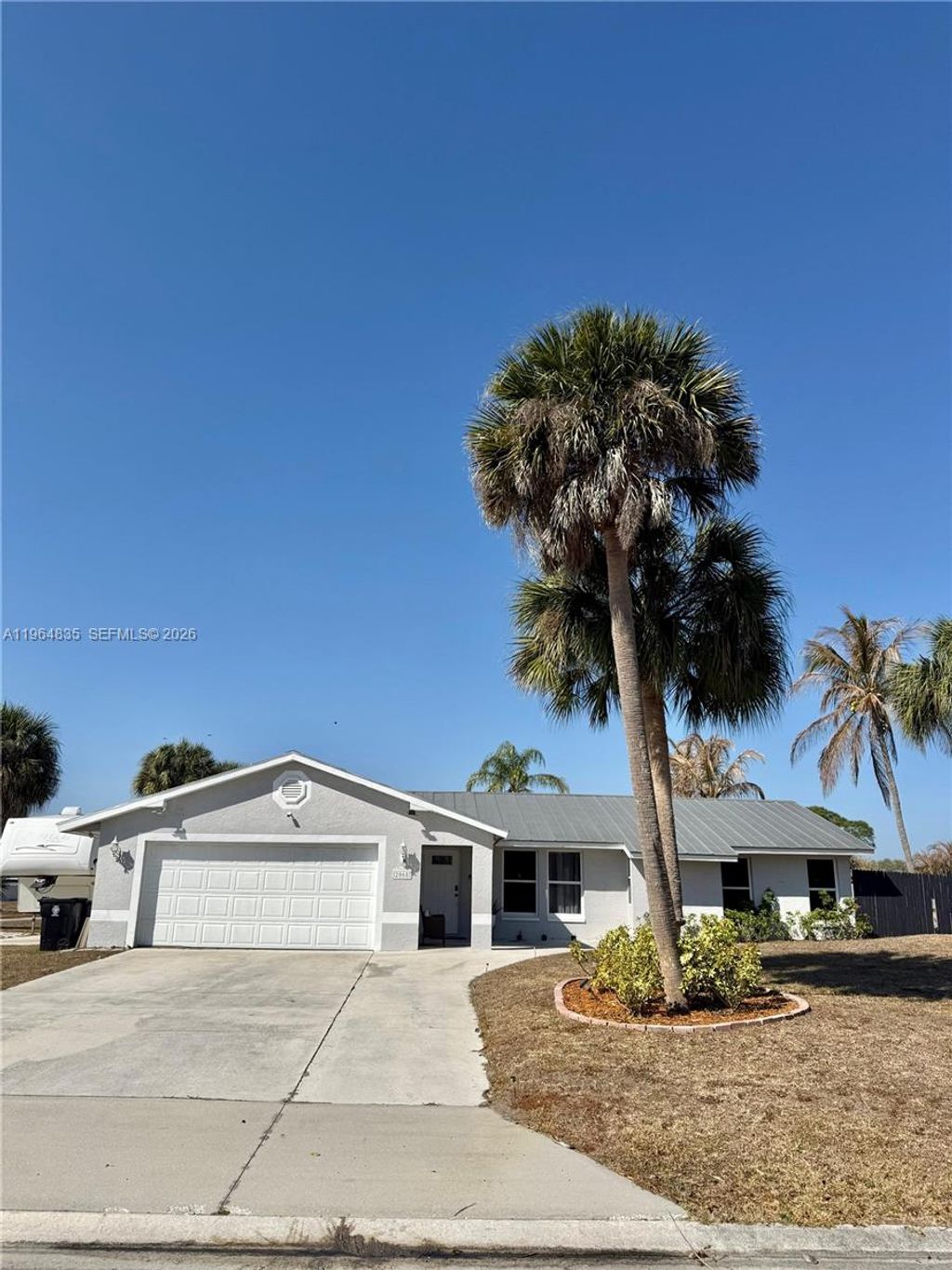 Photo of 2068 SE Triumph Rd, Port St Lucie, FL 34952 (MLS # A11964835)