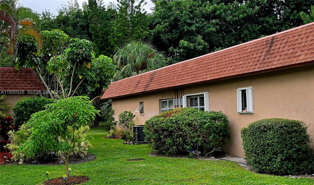 Photo of 1910 Palmland Dr #2, Boynton Beach, FL 33436 (MLS # A11930326)