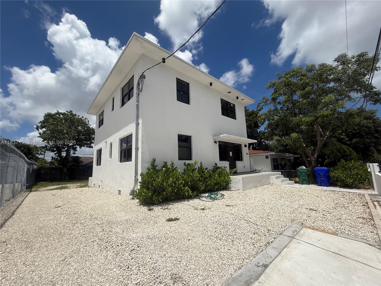 Investment opportunity in the heart of vibrant Wynwood Norte. This fully renovated two-story duplex features two spacious units, each offering 2 bedrooms and 1.5 bathrooms, ideal for comfortable living or immediate income generation. Each level has been modernized with contemporary finishes, perfect for long-term leasing or lucrative short-term rentals. The lot is zoned T4-R with overlays which allows for the development of up to 18 residential units, making it a strategic hold for investors looking to capitalize on the area's rapid transformation. Whether you're an investor, developer, or homeowner seeking flexibility and upside potential. Note: One unit is leased at $3,500 month to month and the other unit is vacant and comes furnished.