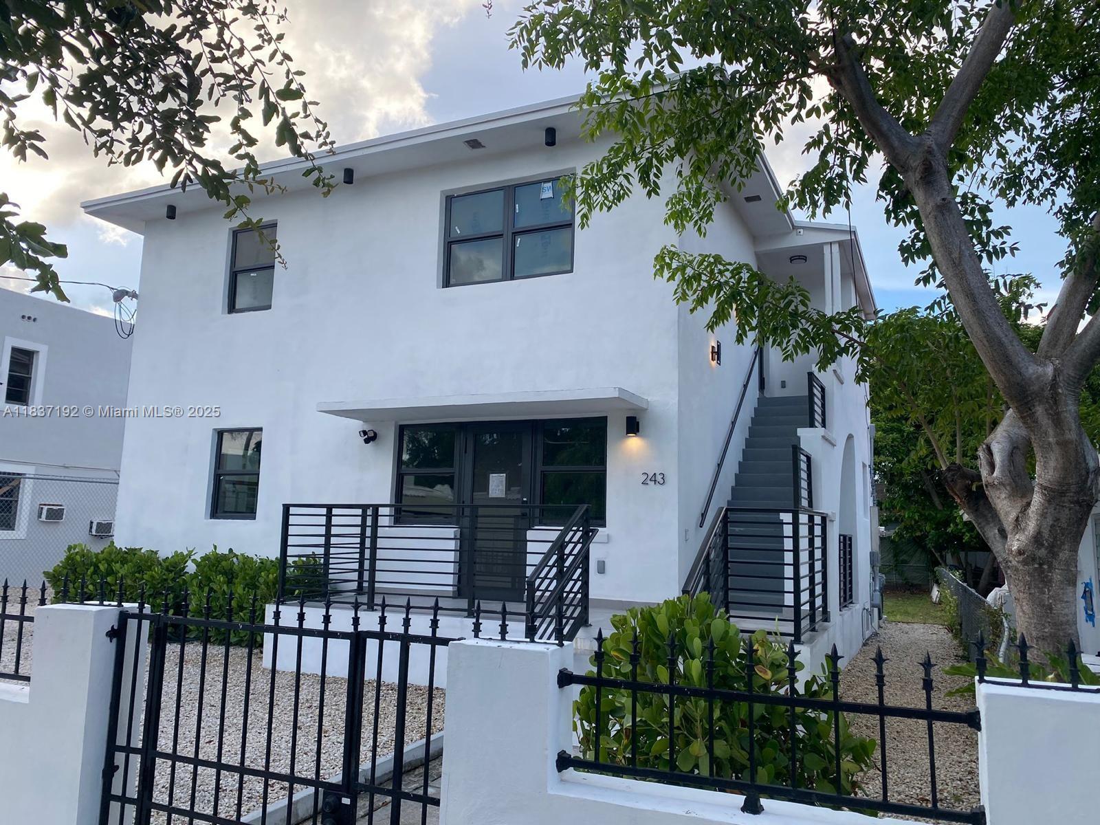 Investment opportunity in the heart of vibrant Wynwood Norte. This fully renovated two-story duplex features two spacious units, each offering 2 bedrooms and 1.5 bathrooms, ideal for comfortable living or immediate income generation. Each level has been modernized with contemporary finishes, perfect for long-term leasing or lucrative short-term rentals. The lot is zoned T4-R with overlays which allows for the development of up to 18 residential units, making it a strategic hold for investors looking to capitalize on the area's rapid transformation. Whether you're an investor, developer, or homeowner seeking flexibility and upside potential. Note: One unit is leased at $3,500 month to month and the other unit is vacant and comes furnished.