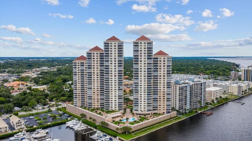Enjoy luxury riverfront living from the 14th floor of this beautifully remodeled 3-bed, 2-bath condo overlooking the Caloosahatchee River, downtown Fort Myers, and the yacht basin. Featuring an open-concept layout, designer finishes, rich wood floors, tray ceilings, and a gourmet kitchen with premium appliances—including a Miele coffee system—this home offers both style and function. The spacious primary suite includes river views, a spa-inspired bath, and walk-in closet. In addition, the property features an additional storage unit. Amenities include a resort-style pool, fitness center, sauna, and assigned garage parking. Just minutes from downtown and steps from Publix, dining, and entertainment.
