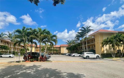 Photo of 11453 NW 39th Ct #114-2, Coral Springs, FL 33065 (MLS # A11781154)
