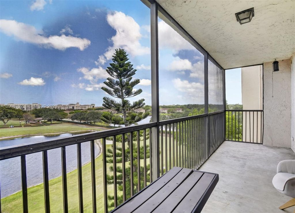 Photo of 3300 W Rolling Hills Cir #606, Davie, FL 33328 (MLS # A12008192)