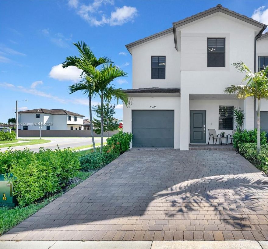Rare end-unit 2-story townhome with garage in Southwest Miami showcasing high-end upgrades throughout. This sought-after Lennar model now sells from $569K with no upgrades, making this $519K resale an exceptional value. Enjoy open living spaces, a soaring 20’ foyer, and a designer kitchen flowing into a private backyard oasis with pergola, dual fans, turf, and concrete flooring. The upstairs primary suite overlooks a lush 5-acre park with spa shower and walk-in closet. Modern finishes include granite counters, stainless appliances, tankless water heater, remote blinds, and marble sills. Clubhouse open—featuring resort-style pool, gym, hot tub, and playground.