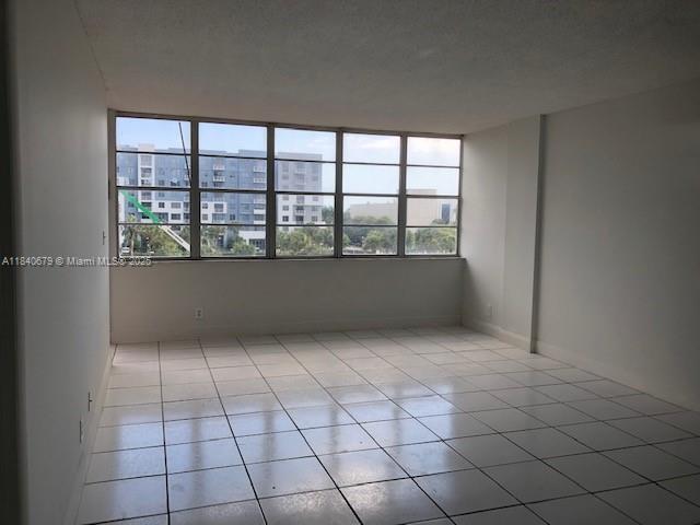 Oversized and light filled 1 bedroom/1.5 bath unit in the heart of NMB. All tile floors, well maintained unit, spacious kitchen, and large balcony with open views. Amazing location, 2 min to US 1, 5 minutes to the beaches, 10 min to Aventura mall and easy access to major expressways. Building has just reopened and is undergoing some repairs. Pool is not open yet.
