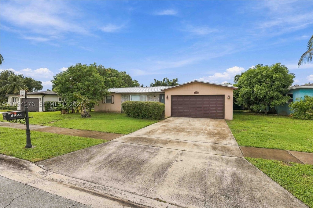 Photo of 6924 NW 9th St, Margate, FL 33063 (MLS # A12094176)
