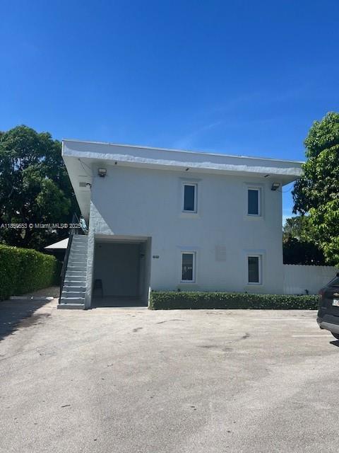 Beautifully remodeled 1 bedroom 1 bath apartment. New kitchen, bathroom and wall unit AC's. Floors were recently polished and cleaned. Unit has impact windows and doors. Second floor unit with balcony. Building has washer/dryer for residents. Water and Garbage included. Comes with 1 assigned parking space.