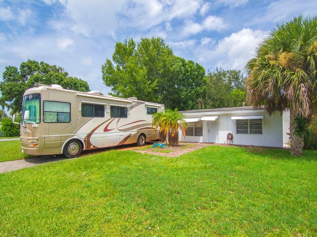 Embrace the Vero Beach lifestyle! This charming 3BR/1BA home is just minutes from sandy beaches, boutique shopping, golf, and waterfront dining. Enjoy bright, open living spaces, a spacious kitchen, and a screened patio perfect for indoor-outdoor living. The primary suite offers a private retreat, while the large backyard is ideal for relaxing, gardening, or entertaining. Nestled in a quiet neighborhood with no HOA, this home combines comfort, convenience, and coastal living all in one.