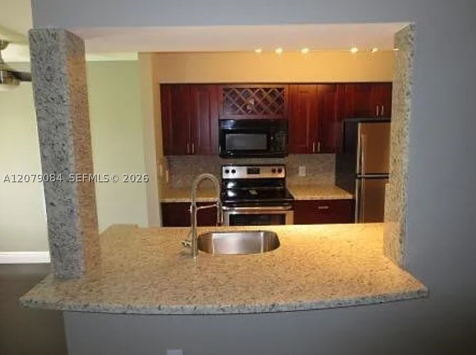 Photo of 2405 NW 33rd St #1211, Oakland Park, FL 33309 (MLS # A12079084)