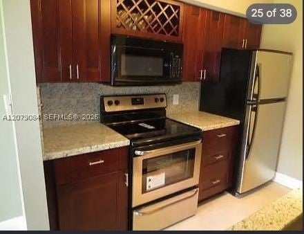 Photo of 2405 NW 33rd St #1211, Oakland Park, FL 33309 (MLS # A12079084)