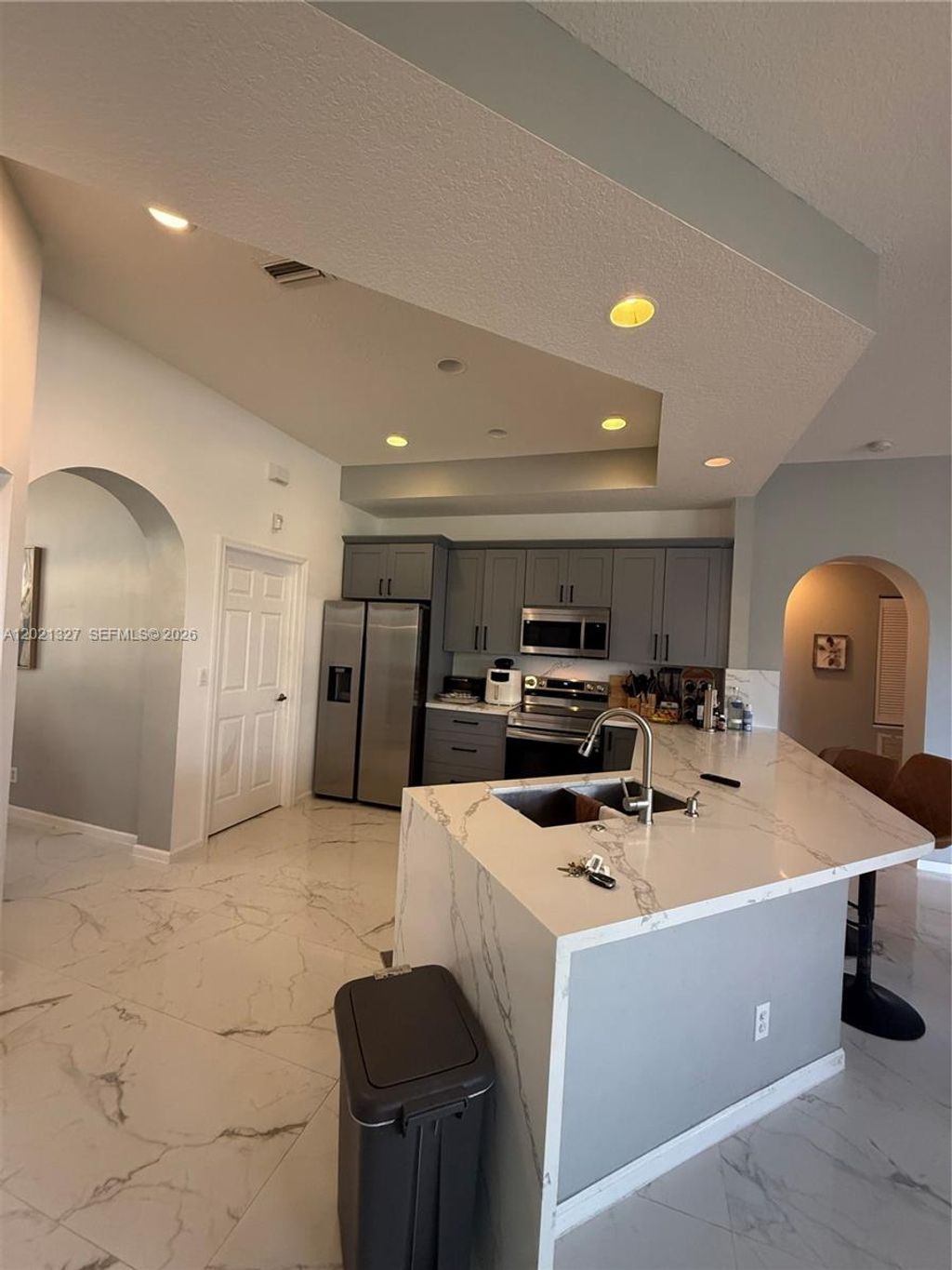 Photo of 5711 NW Zenith Dr, Port St Lucie, FL 34986 (MLS # A12021327)