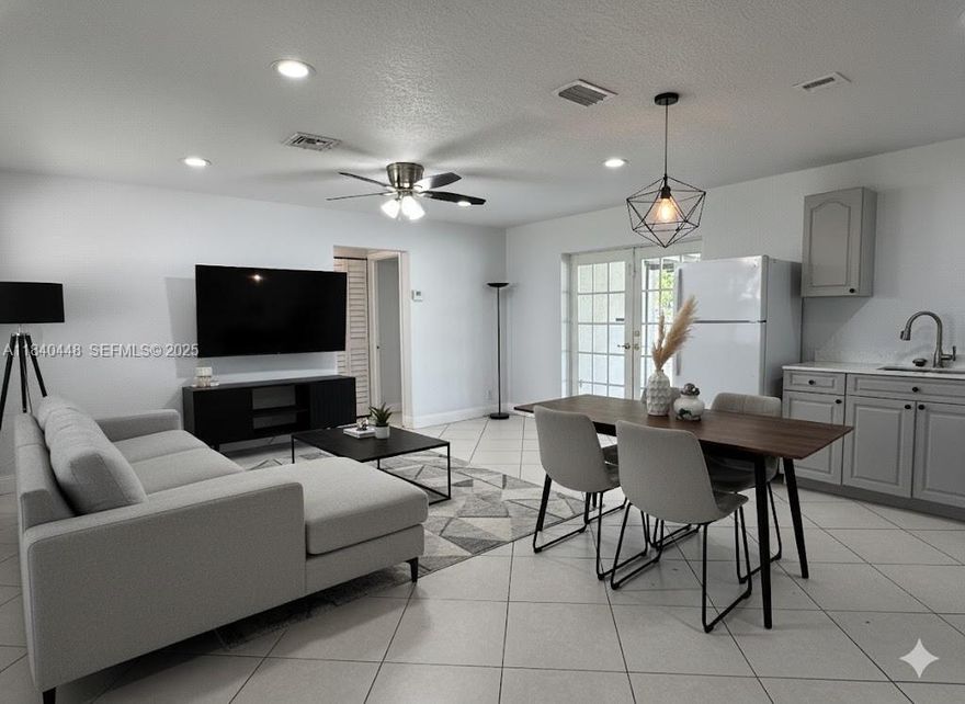 This charming, move-in-ready 3-bed, 2-bath home with an additional oversized flexible room is located in the rapidly developing Melrose Manors neighborhood. It offers an inviting open-concept living and dining area, plus a beautifully updated kitchen featuring quartz countertops, modern cabinetry, and stainless steel appliances. The private master suite includes a walk-in closet, en-suite bathroom, and direct access to the spacious backyard. The versatile 4th room is ideal as an office, playroom, guest space, or hobby room, and connects to a large laundry area with extra storage. Conveniently situated near new shops, schools, parks, and major highways, this home provides comfort, style, and everyday practicality in one complete package. Property has no violations or open permits.