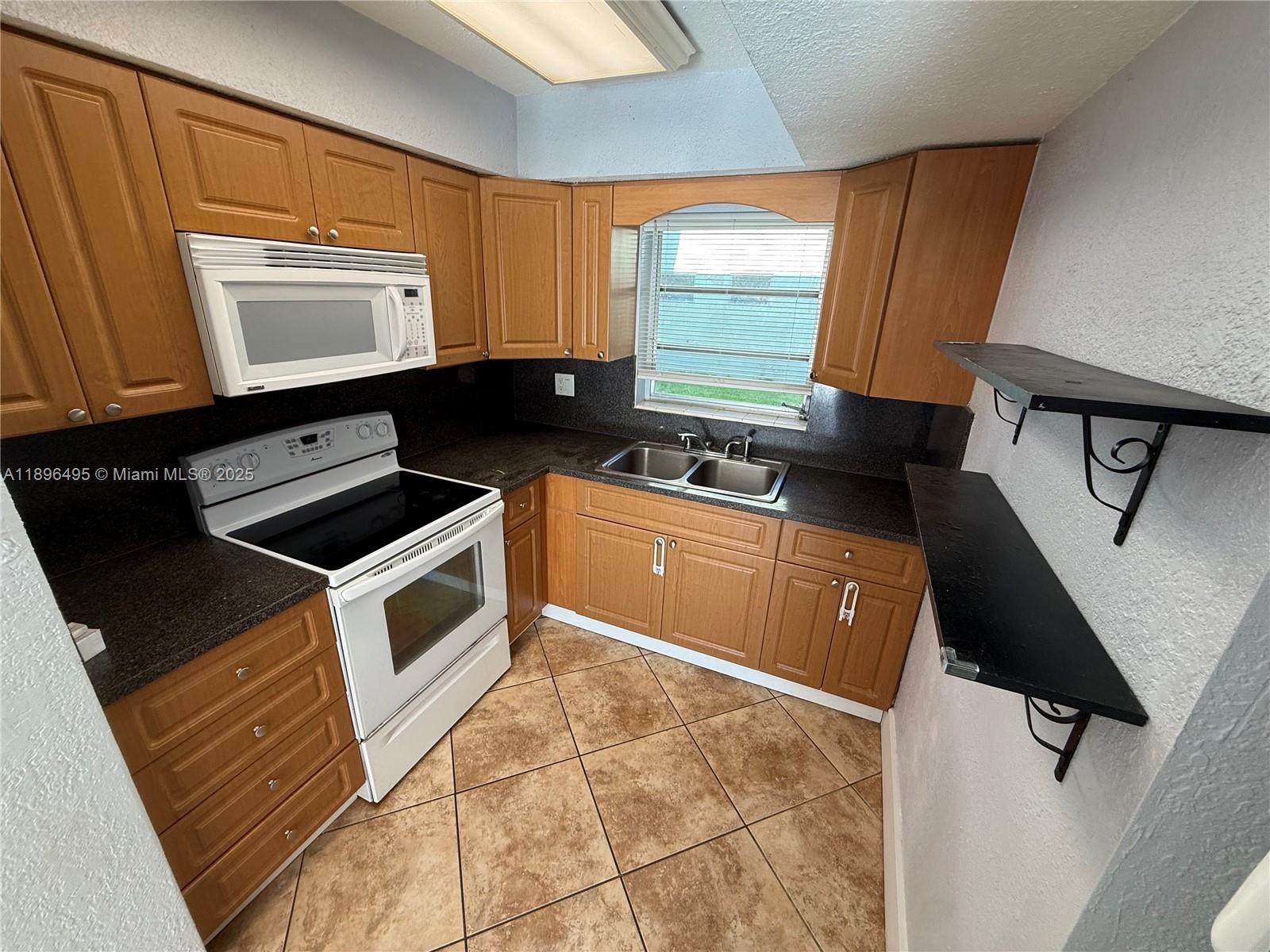 VILLAGE AT DADELAND CONDO - Residential Lease