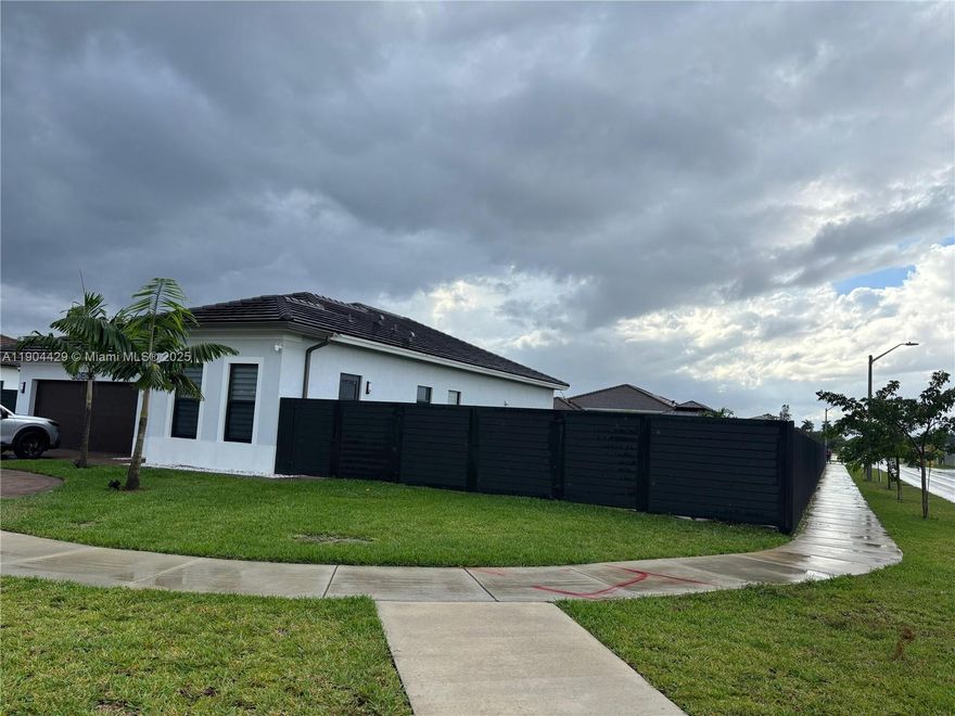 Beautiful 1 bedroom apartment (in-law's quarters) in brand new home. (not converted garage. Impact windows and doors, washer/dryer in unit, very large yard. Electricity, water, wi-fi and lawn maintenance included with rent. Own central A/C just for the unit. Parking for 2 cars. Sorry no pets. Easy to show.