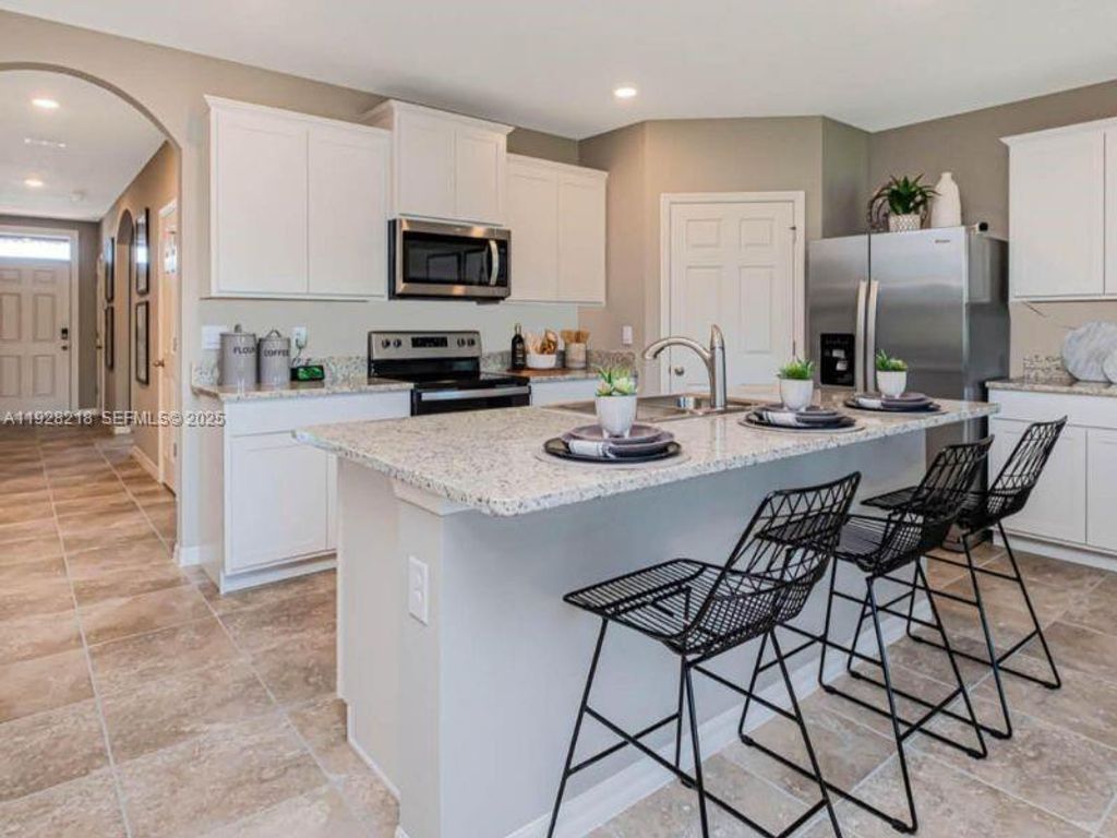 Photo of 9521 Silver Sands Ln, Fort Pierce, FL 34945 (MLS # A11928218)