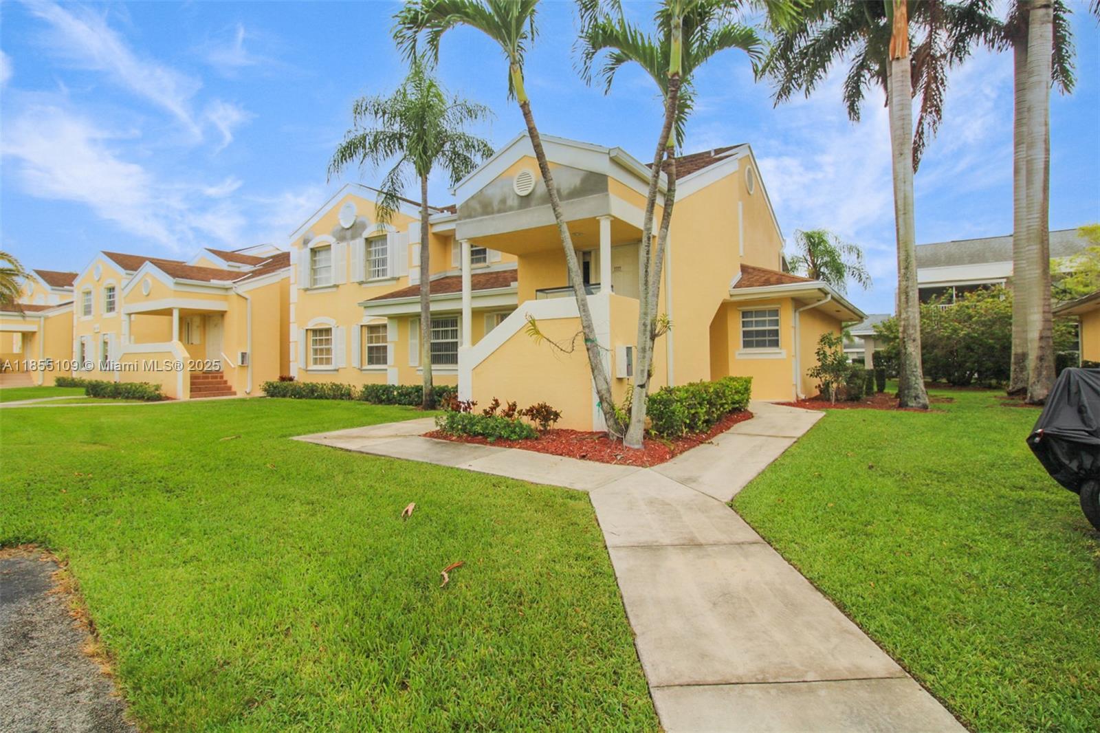First Floor Corner Unit Condo with No Stairs! Spacious 3/2 private entrance, large patio off the kitchen. Open dining room/family room concept, Bathrooms beautifully remodeled and re-plumbed, tile flooring throughout, Enjoy resort-style living with a stunning clubhouse featuring a large resort style pool, library, gym, billiard room, and BBQ and picnic area. Convenient location with easy access to the turnpike, new shopping areas, restaurants and only 30 minutes from the Florida Keys. Condo fees include basic cable, internet, wifi, alarm, clubhouse, roof repairs, guard at gated entrance.