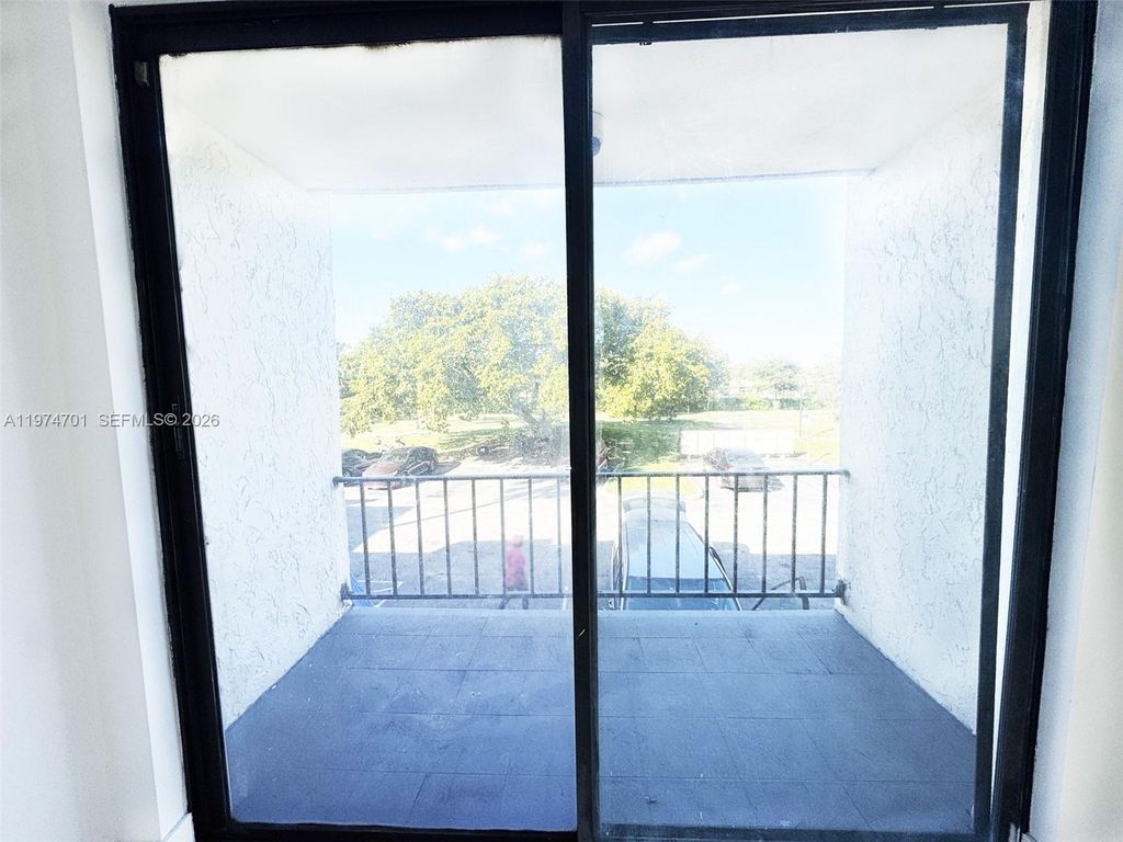 Photo of 1746 NW 55th Ave #203, Lauderhill, FL 33313 (MLS # A11974701)