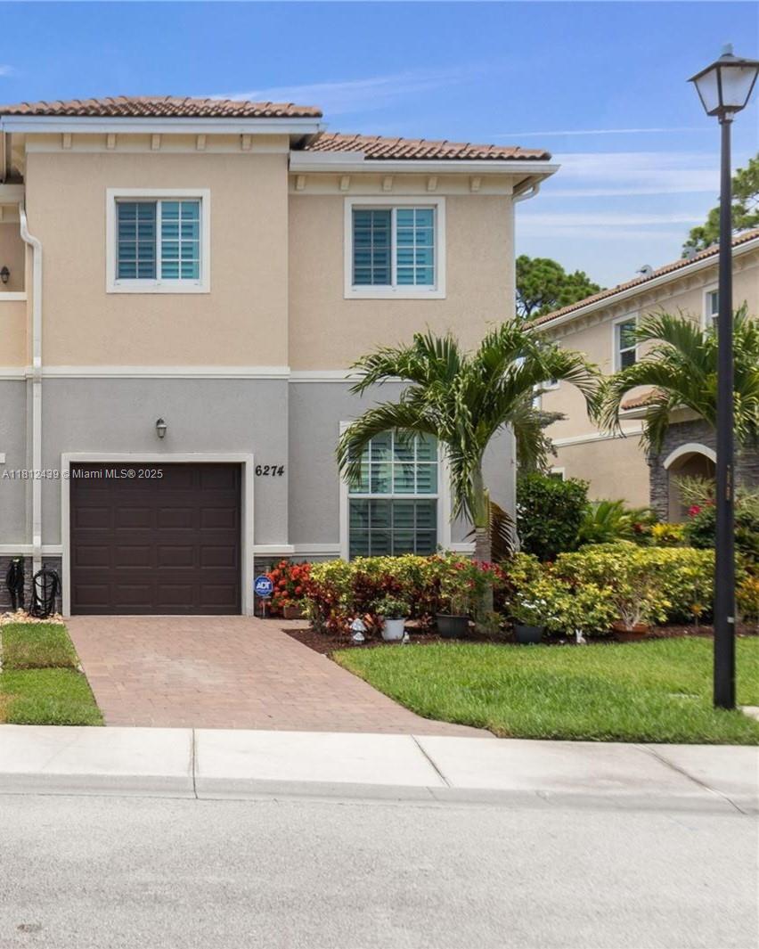 PRICE IMPROVEMENT! IMMACULATE 4 Bedroom, 3 Full Bathroom, End Unit Townhouse in Gated Heritage Enclave! This Modern Home offers Peaceful Preserve Views and Serenity yet convenient to Hobe Sound and Stuart for Shopping and Dining. The Spacious Open-Concept Plan offers Granite Countertops, SS Appliances and White Shaker Cabinets PLUS a First Floor Bedroom with Full Size Bathroom. Plantation Shutters Throughout. Over-Sized Master Bedroom with Large Walk-In Closet and En-Suite Bathroom. Plenty of Parking with a One Car Garage and Extended Driveway. Hurricane Impact Windows throughout. This Easy-Living Community provides Landscaping Maintenance, Master Insurance Policy, Pest Control, Building and Roof Maintenance. Only an HO6 policy needed! Up to 3 pets allowed with restrictions.