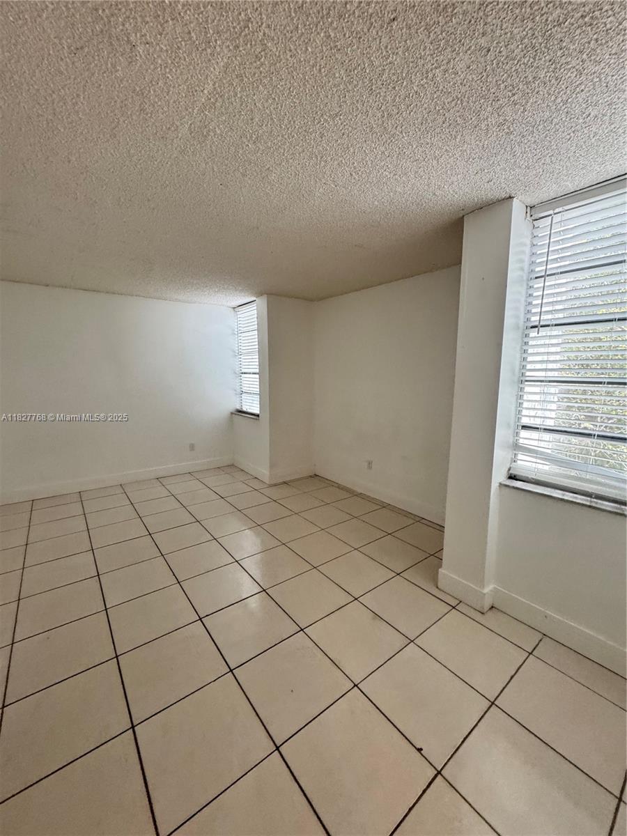 NORTHEAST PALMS CONDO - Residential