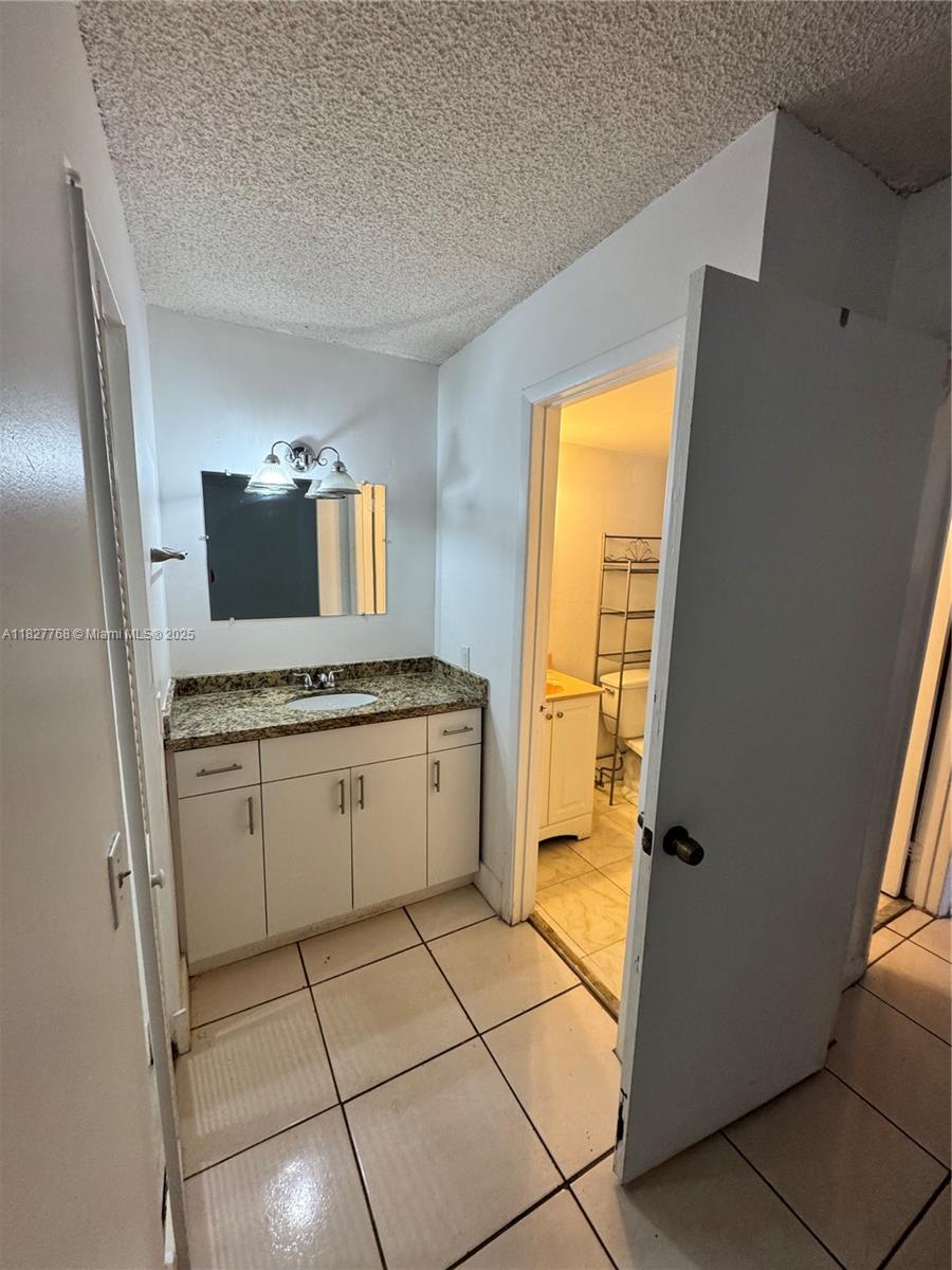 NORTHEAST PALMS CONDO - Residential