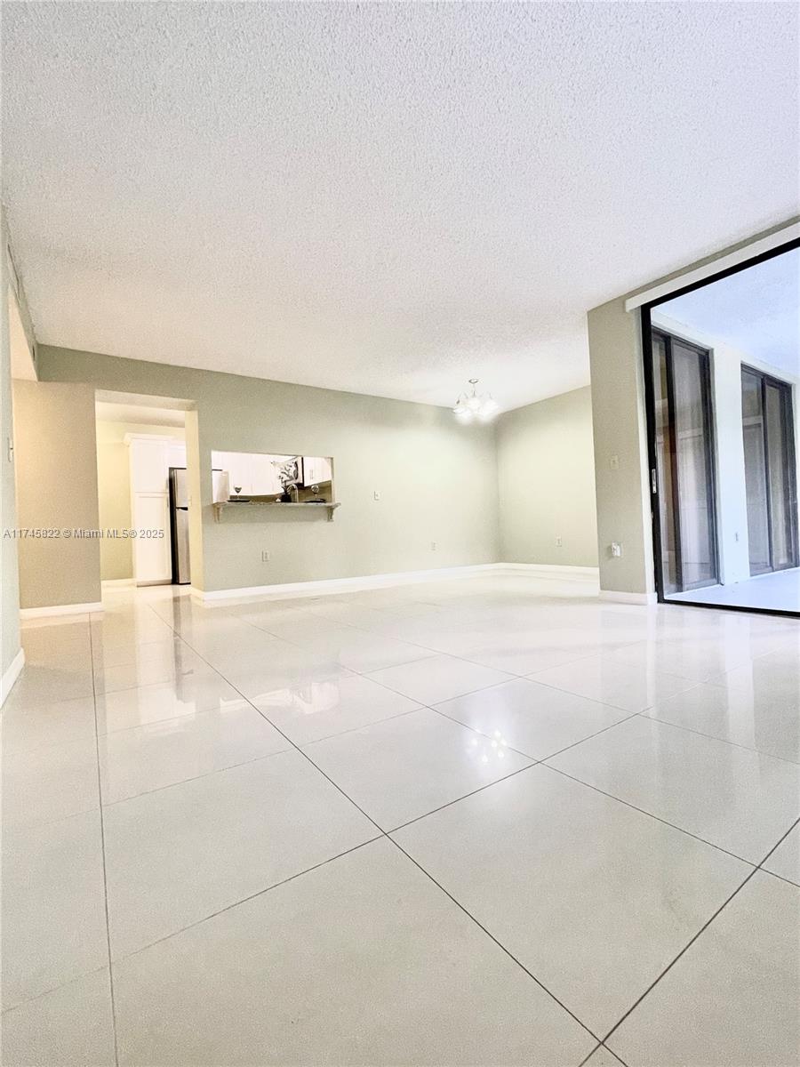 Welcome to this spacious and bright 3-bedroom, 2-bathroom apartment, perfectly situated in the heart of Plantation! This well-maintained unit offers an open floor plan, allowing for plenty of natural light and a seamless flow between the living, dining, and kitchen areas. Enjoy the convenience of in-unit laundry amd relax on your screened balcony and Storage Room Located in a peaceful and family-friendly community with amenities such as a pool. You’ll be close to shopping centers, dining, parks and more !!! Don’t miss out on this incredible opportunity to make this beautiful apartment your next home. Schedule a showing today!