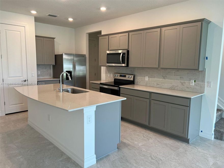 BEAUTIFUL TOWNHOME at Rachette Square in Greenacres. This amazing townhome offers 3 bed, 2.1 bath, modern grey shaker cabinets and quartz countertops. Stainless appliances, stylish fixtures. Open living spaces, and private Owner's Suites, Basic cable is included** Townhome also includes a quiet back patio area as well as a 1 car garage. Great Location! Minutes from Downtown West Palm Beach, Wellington attractions, the Palm Beach International (PBI) airport, stunning Florida beaches, and much more.