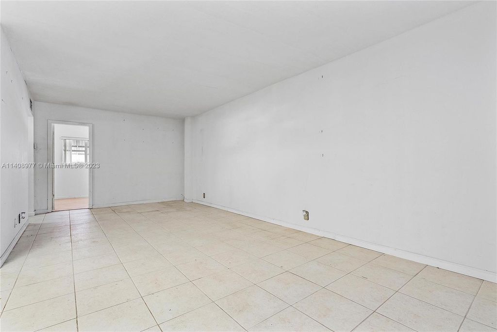 Photo of 300 Golden Isles Dr #209, Hallandale Beach, FL 33009 (MLS # A11408977)