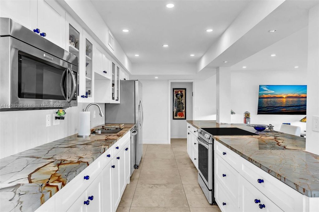 Photo of 3589 S Ocean Blvd #306, South Palm Beach, FL 33480 (MLS # A11438298)