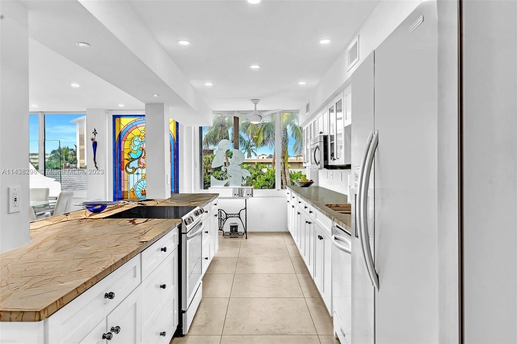 Photo of 3589 S Ocean Blvd #306, South Palm Beach, FL 33480 (MLS # A11438298)