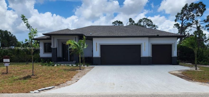 Stunning single-story residence blends luxury, functionality, and high ceilings with an open-concept layout. The designer kitchen features sleek wood cabinetry, S.S appliances, and LED lighting, seamlessly integrated with the living and dining areas for effortless entertaining. Designed for comfort, it offers three spacious bedrooms plus a versatile den, ideal for a home office, guest room, or flex space. The primary suite includes a spa-inspired full bath, plus an additional full bath and powder room. Hurricane-impact windows, three-car garage, municipal water and sewer. Scheduled for completion in Oct. /25, just 5 minutes from the beautiful Gulf beaches, this is a rare opportunity to own a brand-new home in Placida with modern design and coastal convenience. 10K CLOSING CONTRIBUTION