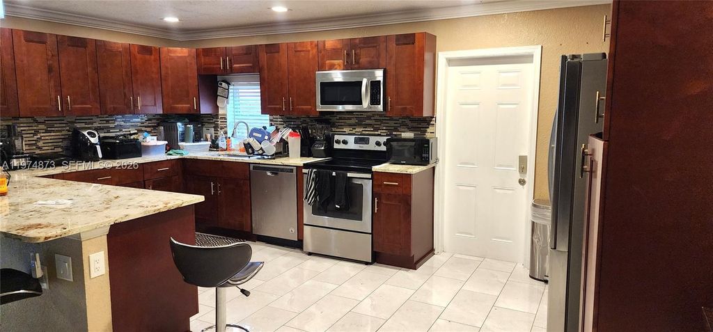 Photo of 7707 SW 8th St #0, North Lauderdale, FL 33068 (MLS # A11974873)