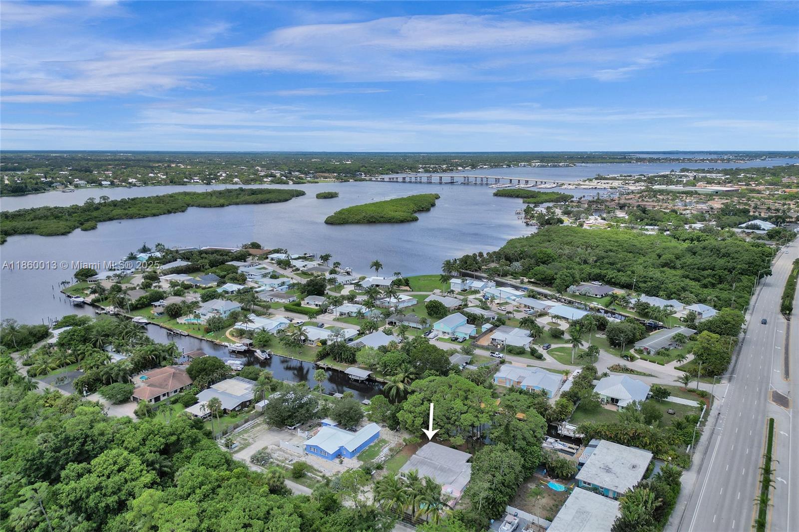 BOATERS' dream investment! 15,000 sq ft LOT... LOCATION, LOCATION, LOCATION! House is a 2/2 1,900 sq ft.
WATERFRONT LOT, with no fixed bridges and only a 10 min boat ride to the ocean via St. Lucie River. 75 feet of allowable dock space... needs dredging, sea wall and dock (as seen across canal on neighboring house)
NO HOA, NON GATED COMMUNITY
House needs updating... or you can remove and build two new ones :) Pool in great condition!