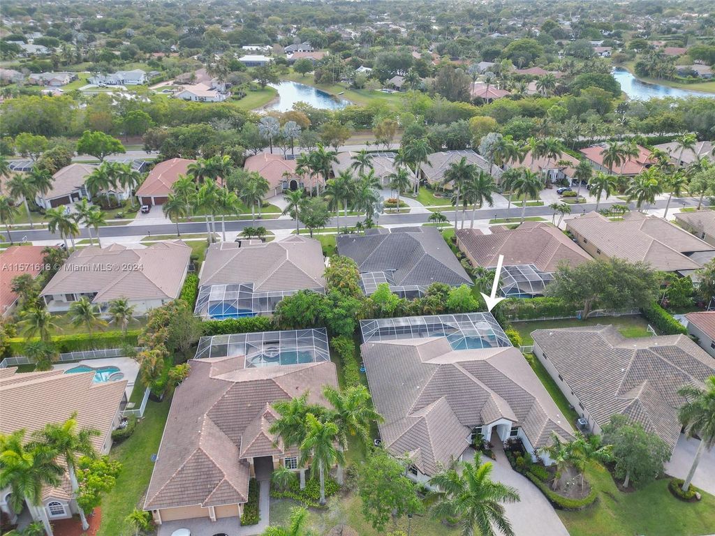 Photo of 21312 Rock Ridge Dr, Boca Raton, FL 33428 (MLS # A11571616)